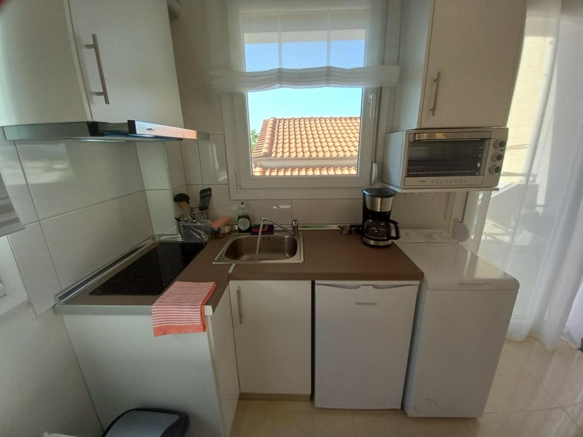 Elenis House Apartamento Néa Péramos Exterior foto